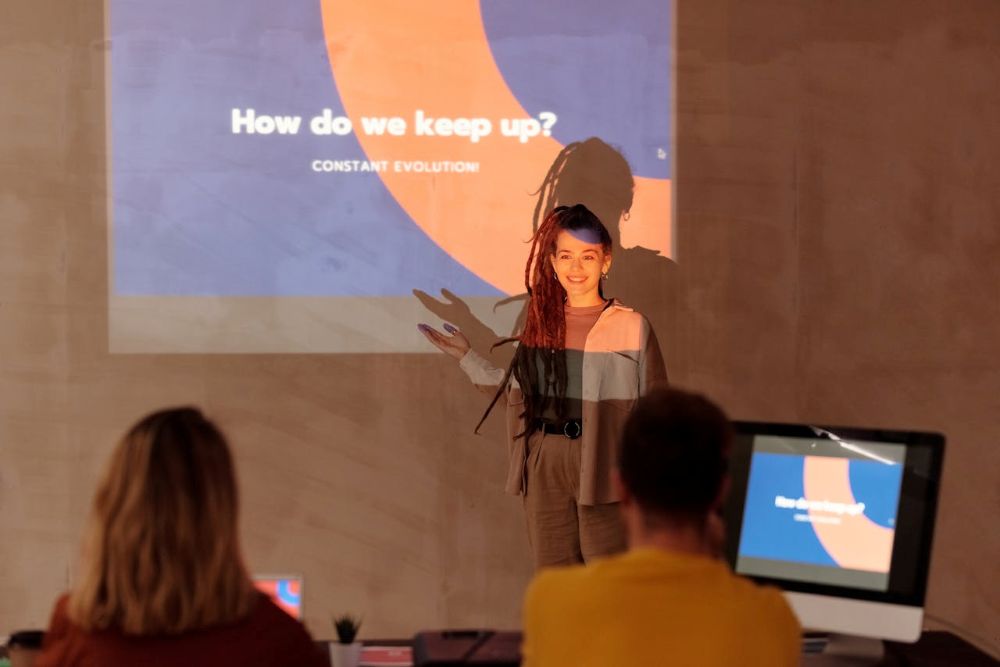 A young woman giving a presentation 