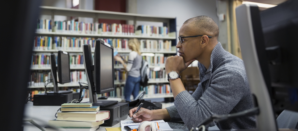 Man at computer, diversity