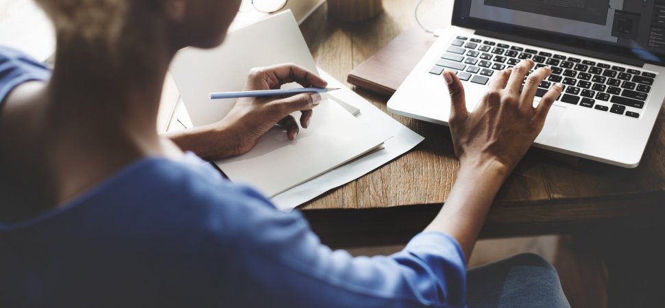 Woman at desk with laptop