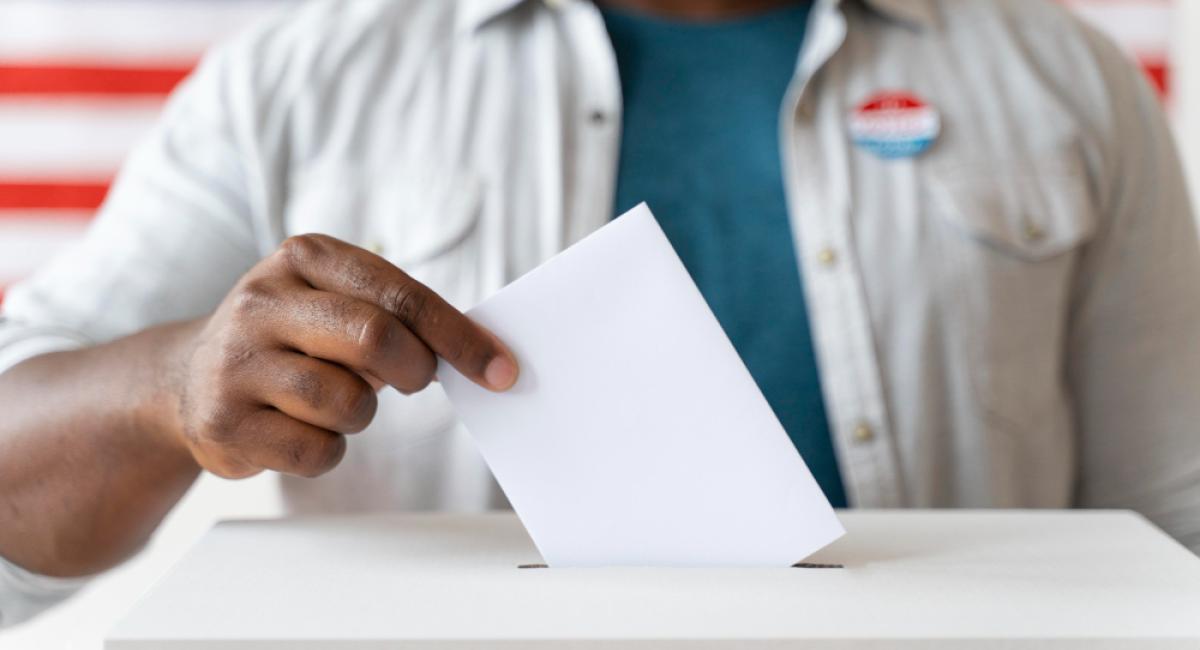 An African American man on voter registration day