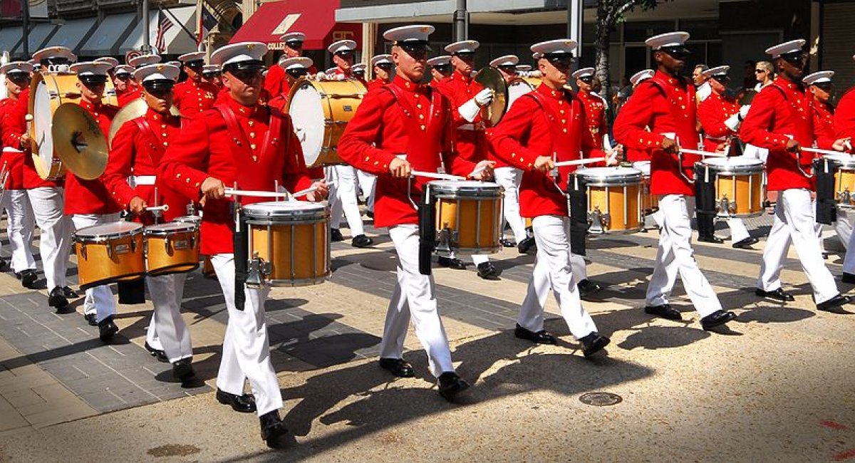 Marching band in red and white uniforms