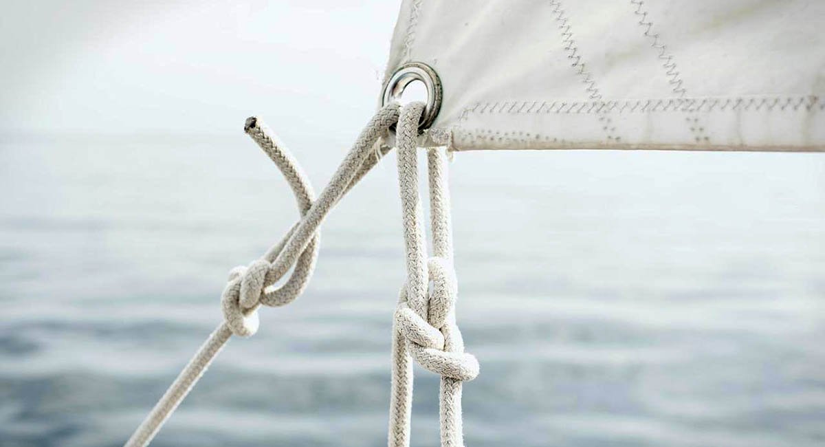 corner of sail with rope ties